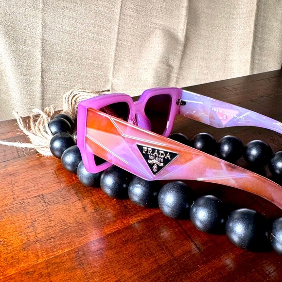 This is a Prada Sunglass. - Picture 3 of 5